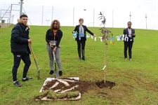 Students Plant Trees to Mark Call To Earth Day