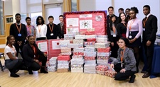 Students fill 135 shoe boxes with gifts for Operation Christmas Child.